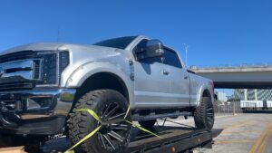 What is a flatbed tow truck?